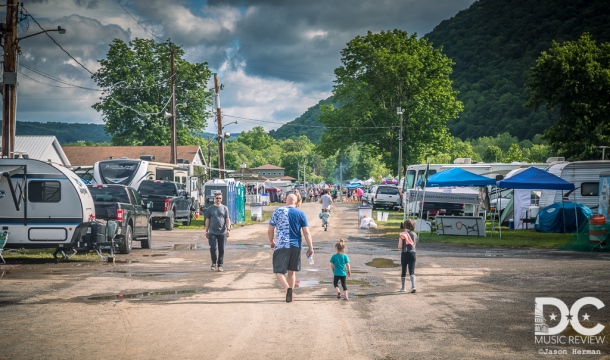 Families walk throughout the venue on their way back to their campgrounds.