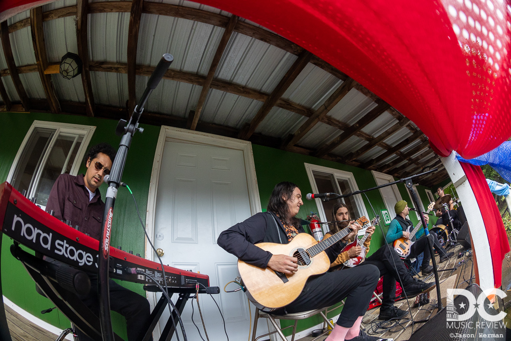 Magic Beans perform a secret acoustic set in front of their cabin Magic Beans perform a secret acoustic set in front of their cabin