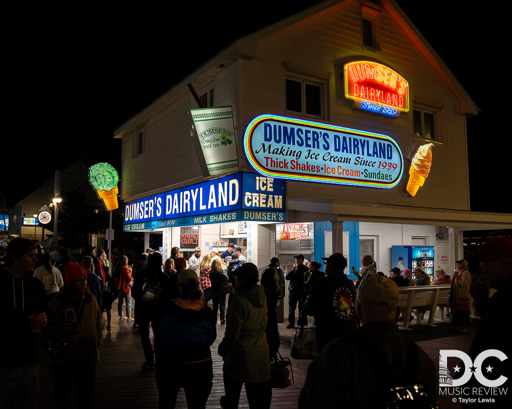 People enjoying the Boardwalk of Ocean City, MD People enjoying the Boardwalk of Ocean City, MD