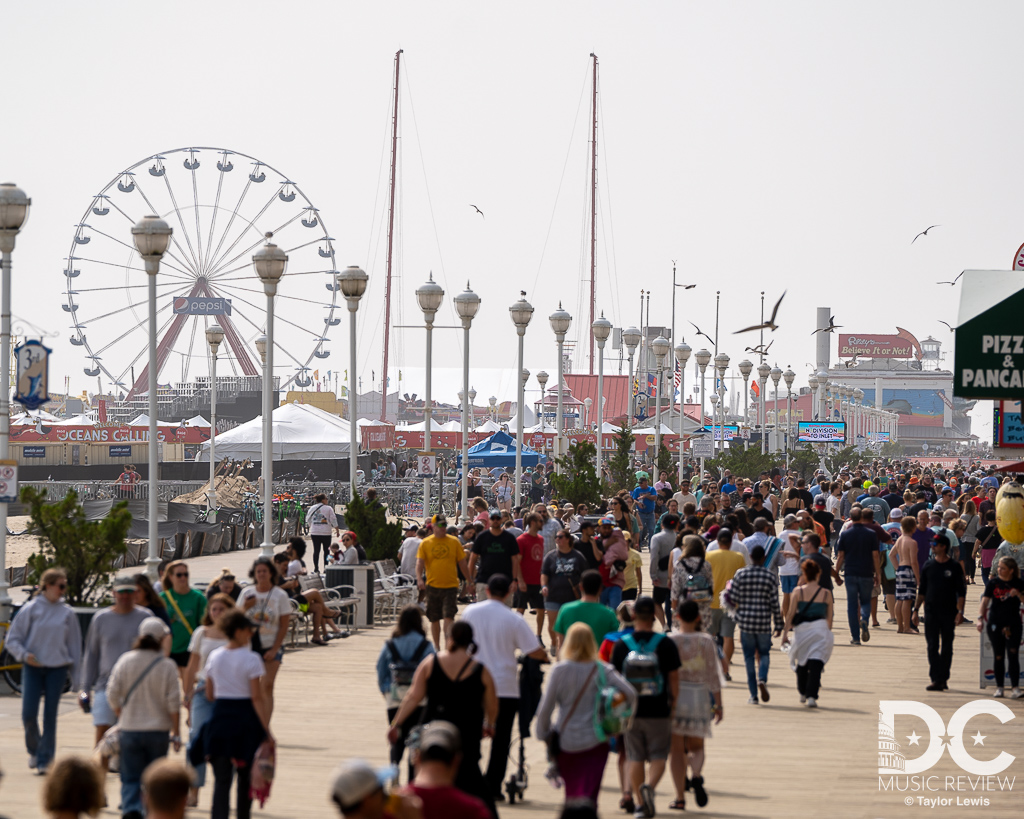 People enjoying the Boardwalk of Ocean City, MD People enjoying the Boardwalk of Ocean City, MD