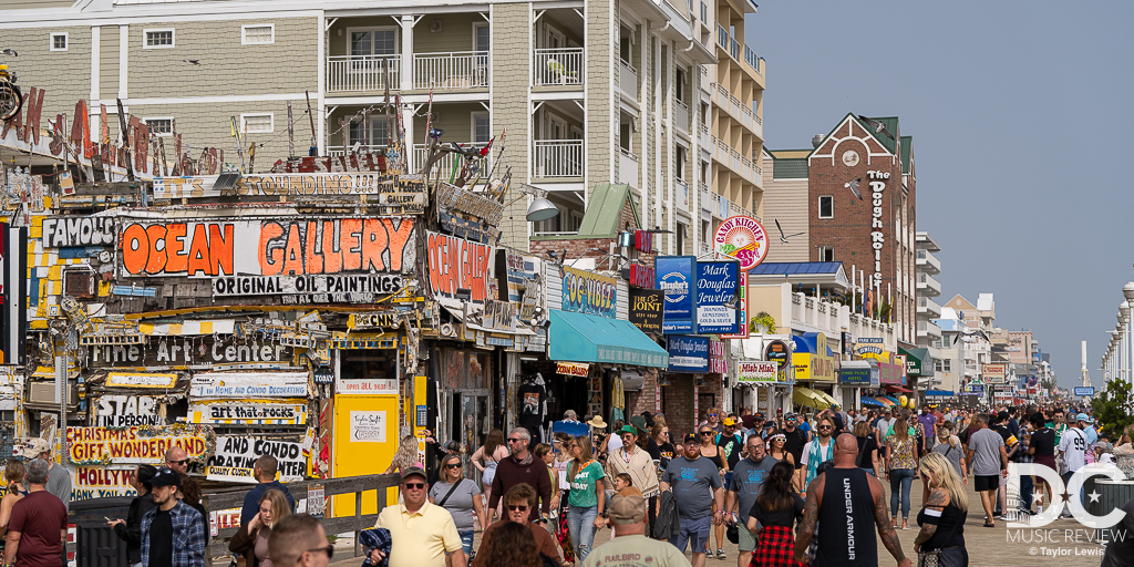 People enjoying the Boardwalk of Ocean City, MD People enjoying the Boardwalk of Ocean City, MD