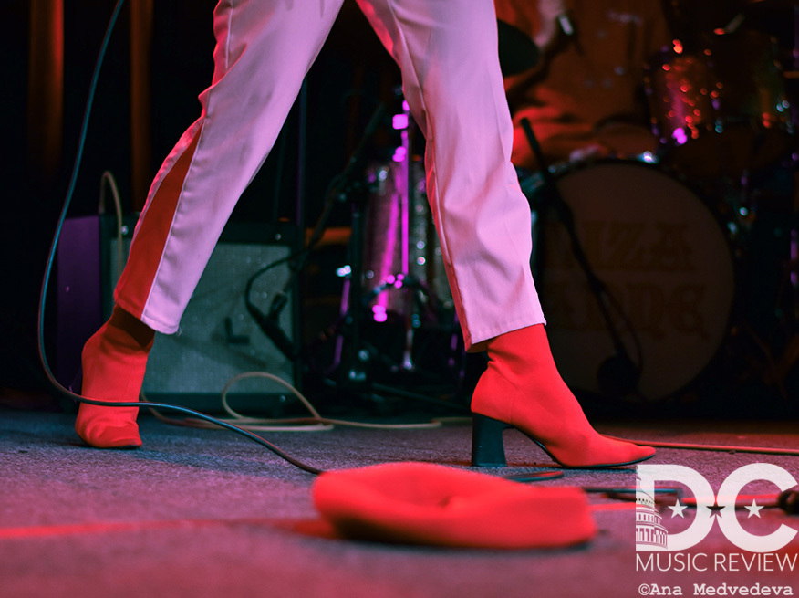 Liza Anne's red beret at her feet