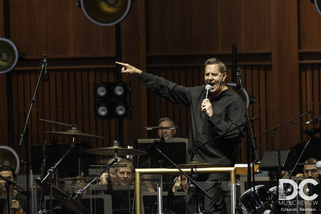 Conductor Steve Reineke introduces Dispatch to the stage.