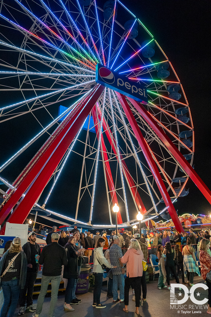 People enjoying the Boardwalk of Ocean City, MD