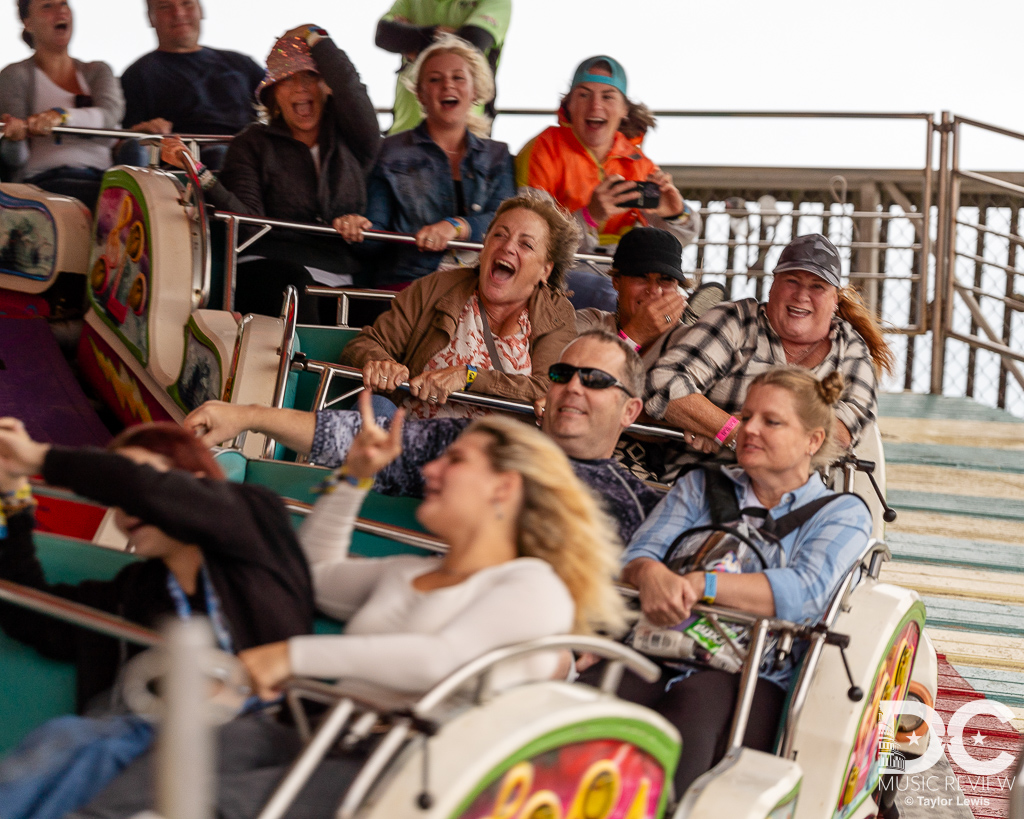 People enjoying the Boardwalk of Ocean City, MD