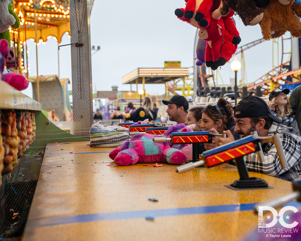 People enjoying the Boardwalk of Ocean City, MD