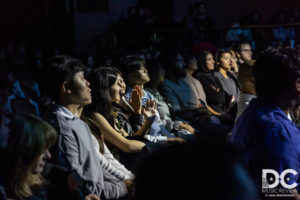 The audience at The Lincoln Theatre enjoying Adam Melchor