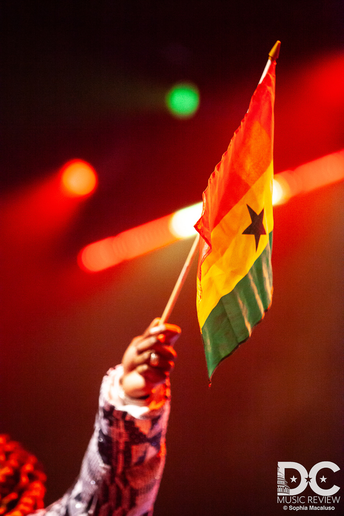 Kwasi Beast waves his Ghanaian flag with pride