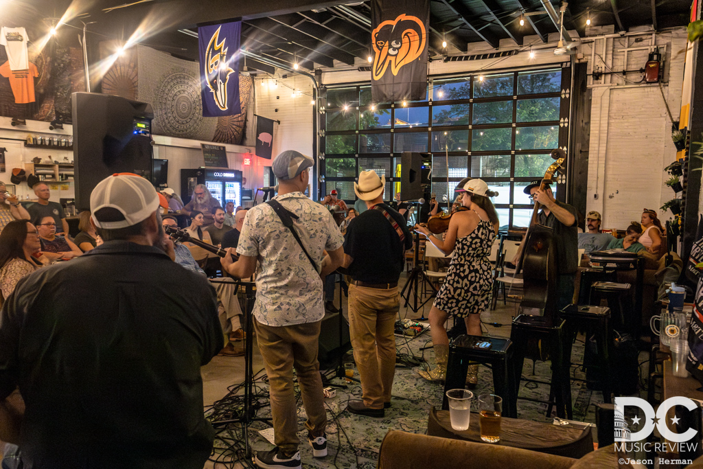 A musical interlude as Tim Newby and the audience watches