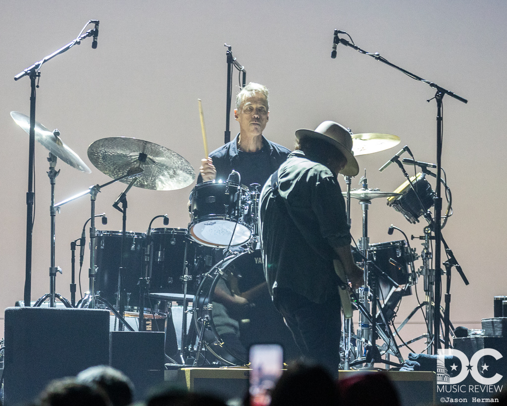 Eddie Vedder with Matt Cameron looming large